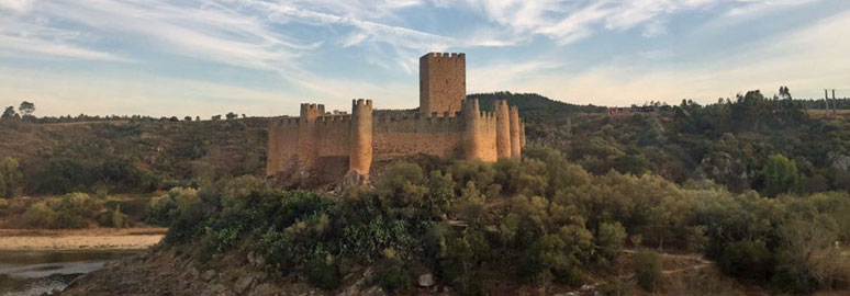 Madrid to Lisbon by train: Castle between Badajoz & Entroncamento