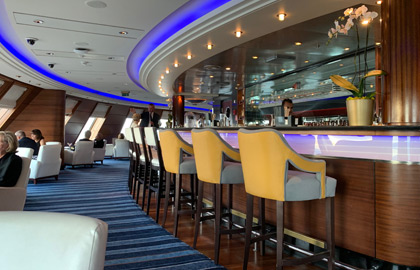 The QM2's Commodore Club on 9 deck forward.