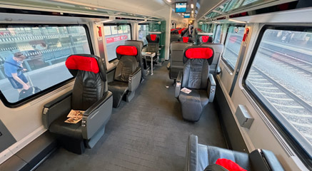 Business class on a railjet train, showing aisle